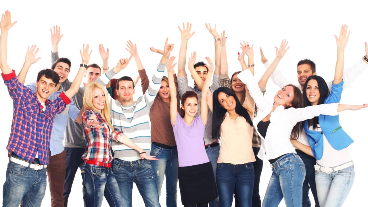 Large group of cheerful young adults.