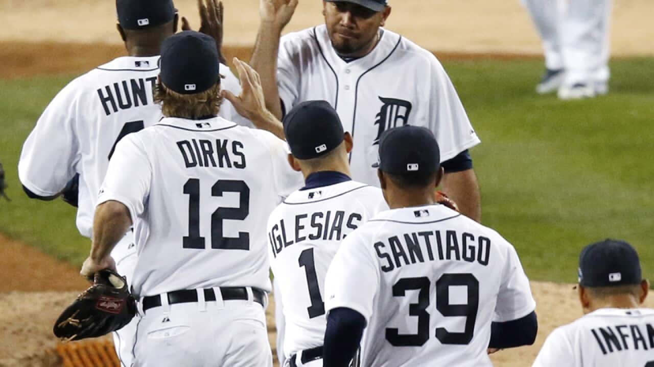 Detroit Tigers players celebrate victory over Oakland