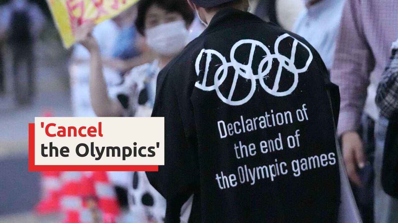 Protesters call for the government to cancel the Olympics amid COVID-19 spike