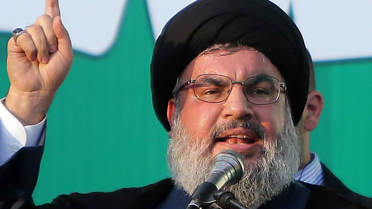 Hezbollah warns US as protests continue