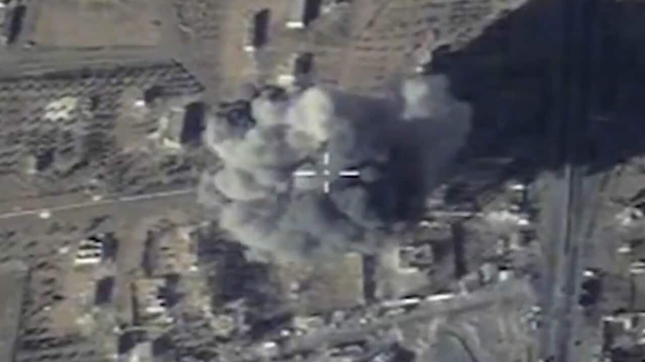 A handout photograph made available on 09 December 2015 by the Russian Defence Ministry showing the explosions in Raqqa province, Syria