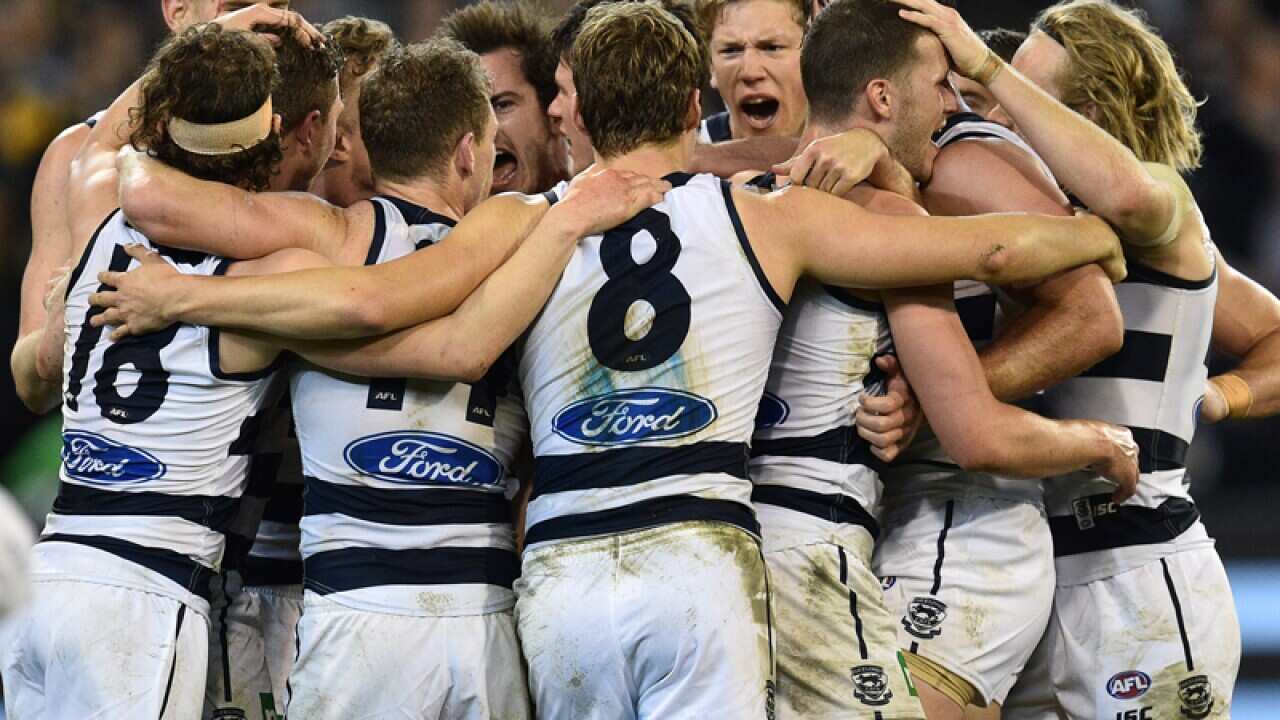 Geelong players react
