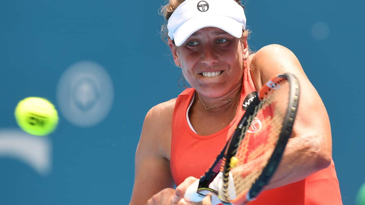 Barbora Strycova in action against Caroline Wozniacki