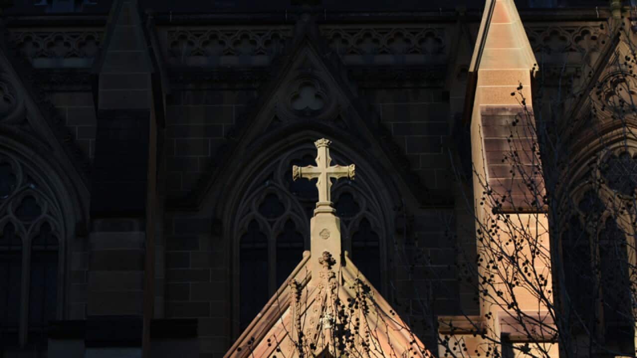 A cross on the exterior of St Mary's Cathedral