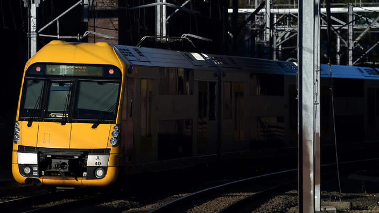 A commuter train in Sydney on Tuesday, May 5, 2015. (AAP Image/Paul Miller) NO ARCHIVING