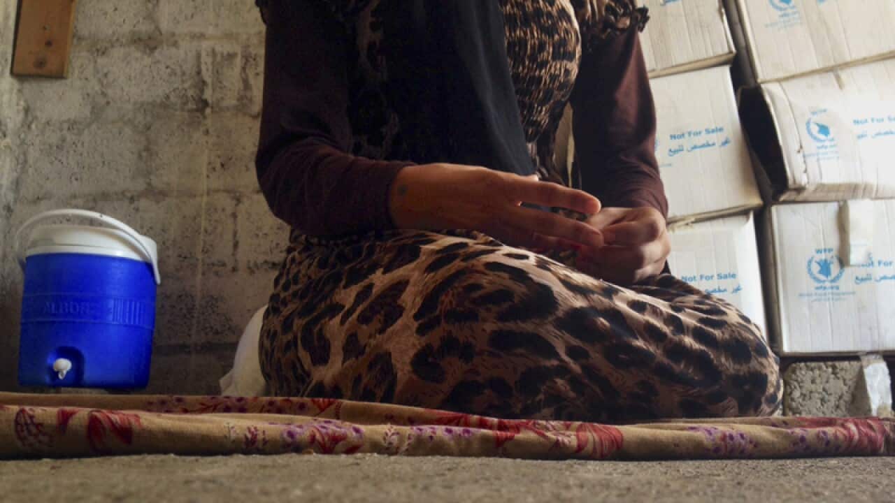 A 15-year-old Yazidi girl captured by the Islamic State