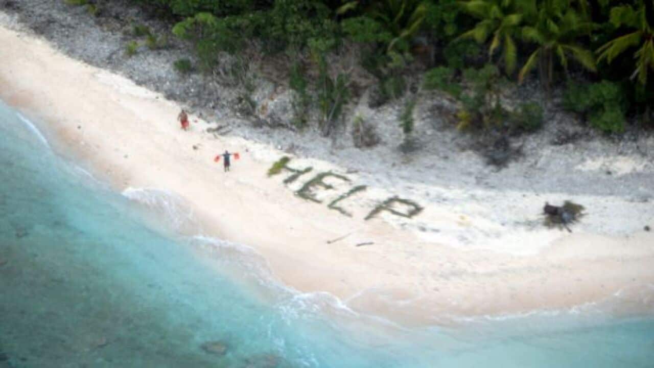 3 rescued from remote island after using palm fronds to spell 'help'