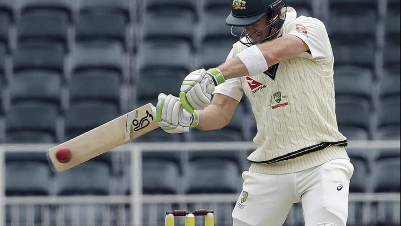 Australia's captain Tim Paine plays a shot