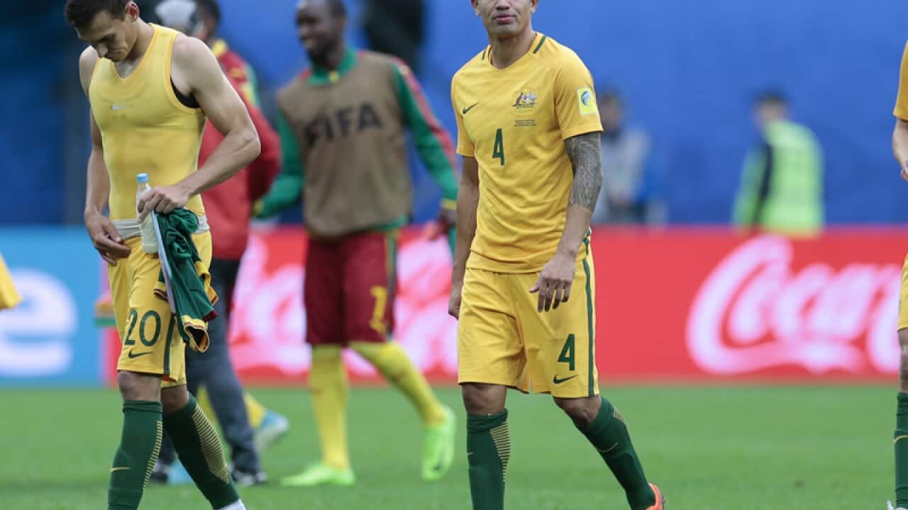 From left, Australia's Trent Sainsbury, Tim Cahill and Jackson Irvine