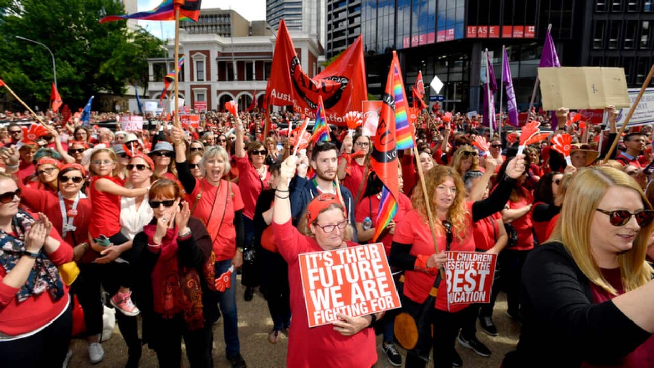 South Australian public school teachers are seen protesting at Flinders Street, in Adelaide, Thursday, November 29, 2018.