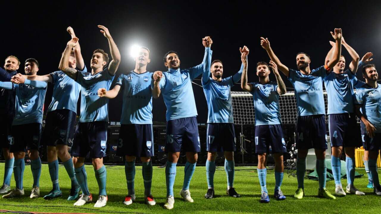 Sydney FC celebrate after their win over Melbourne Victory during the A-League Semi Final 2 match at Jubilee Stadium in Sydney (AAP Image/Dean Lewins)