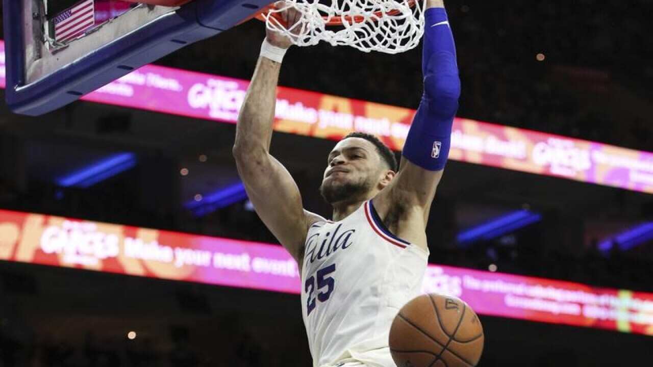 Philadelphia 76ers' Ben Simmons dunks.