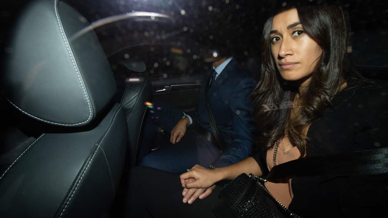 Wallabies star Israel Folau leaves a Code of Conduct hearing May with wife Maria.