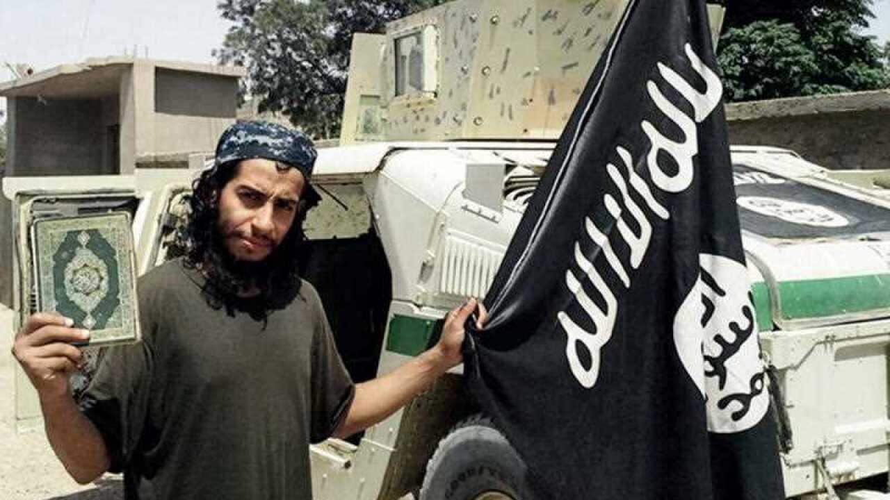 This undated image made available in the Islamic State's English-language magazine Dabiq, shows Belgian national Abdelhamid Abaaoud who was identified by French authorities on Monday Nov. 16, 2015, as the presumed mastermind of the terror attacks last Fri
