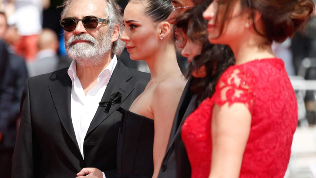 Turkish actor Haluk Bilginer (L) during the Cannes festival