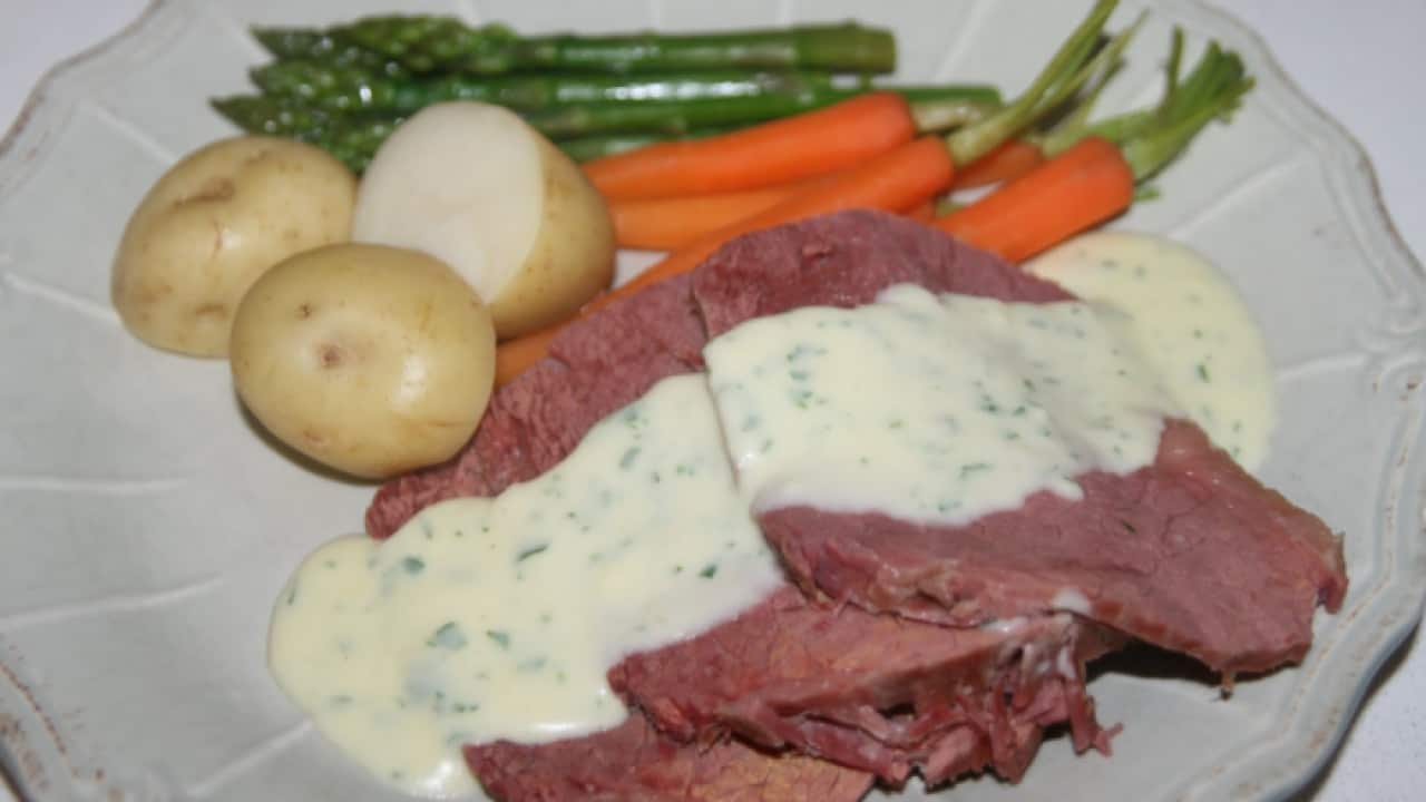 Corned Beef with white sauce and vegetables