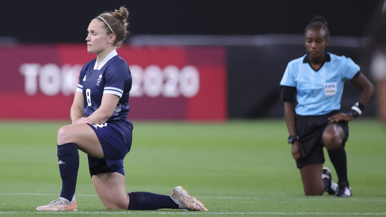 Great Britain's women's football team took a knee to protest against racism prior to their game against Chile in Tokyo.