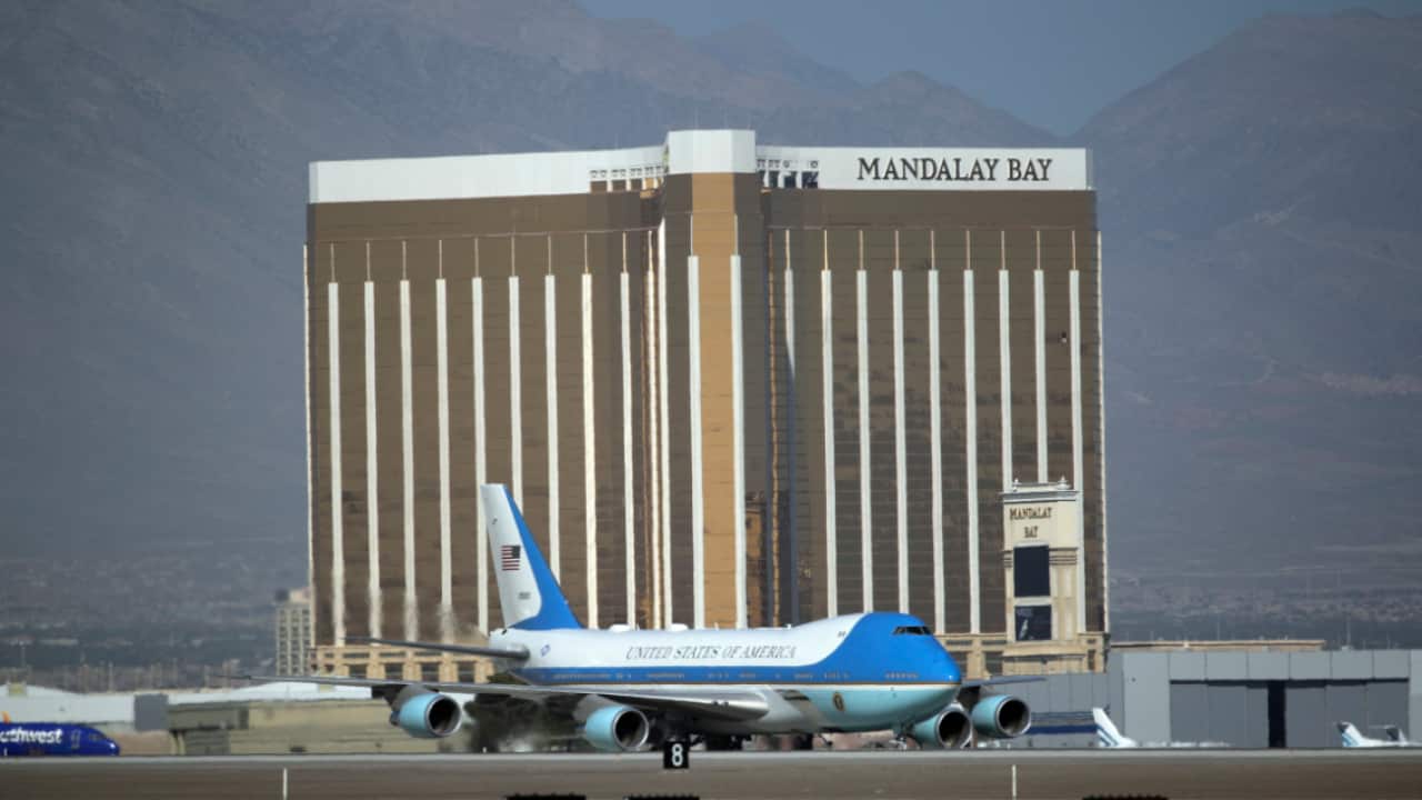 Air Force One carrying President Trump taxis on the runway past Mandalay Bay on Wednesday, October 4, 2017, in Las Vegas.