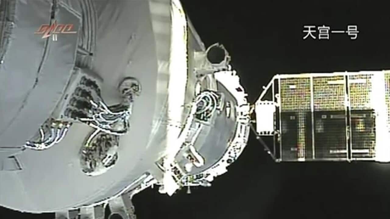 China's Shenzhou-8 spacecraft is docked with Tiangong-1 space station