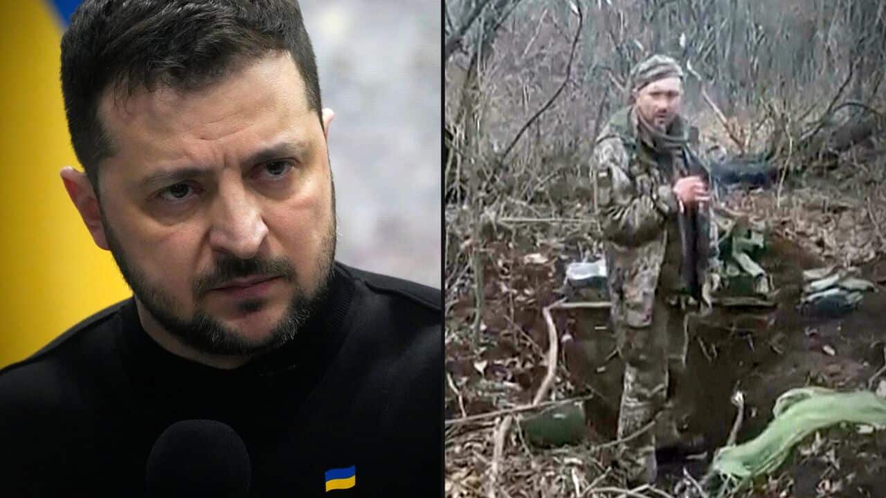 Ukrainian President Volodymyr Zelenskyy and a man in army fatigue