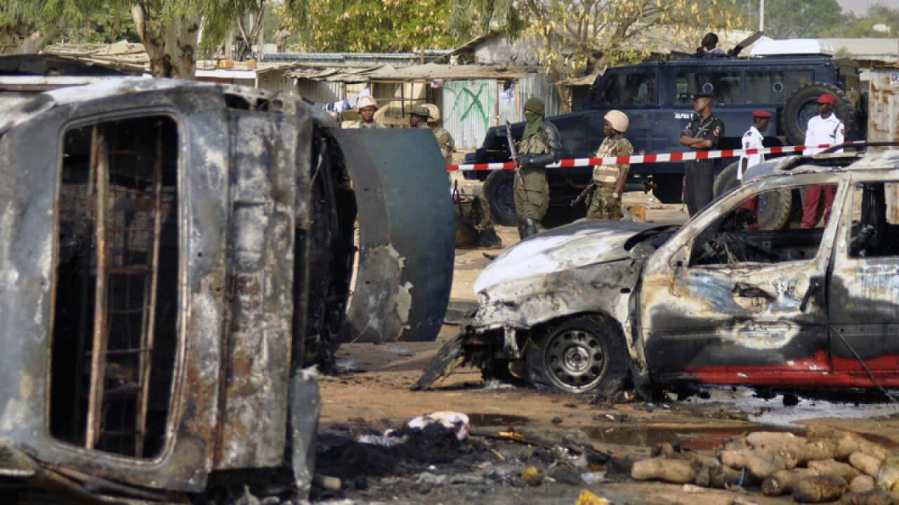 The scene of a suicide bomb explosion at a bus station in Kano