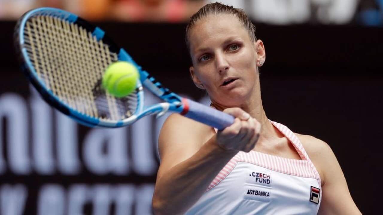 Karolina Pliskova of the Czech Republic makes a forehand return to United States' Madison Brengle during their second round match at the Australian Open tennis championships in Melbourne, Australia, Thursday, Jan. 17, 2019. (AP Photo/Mark Schiefelbein)