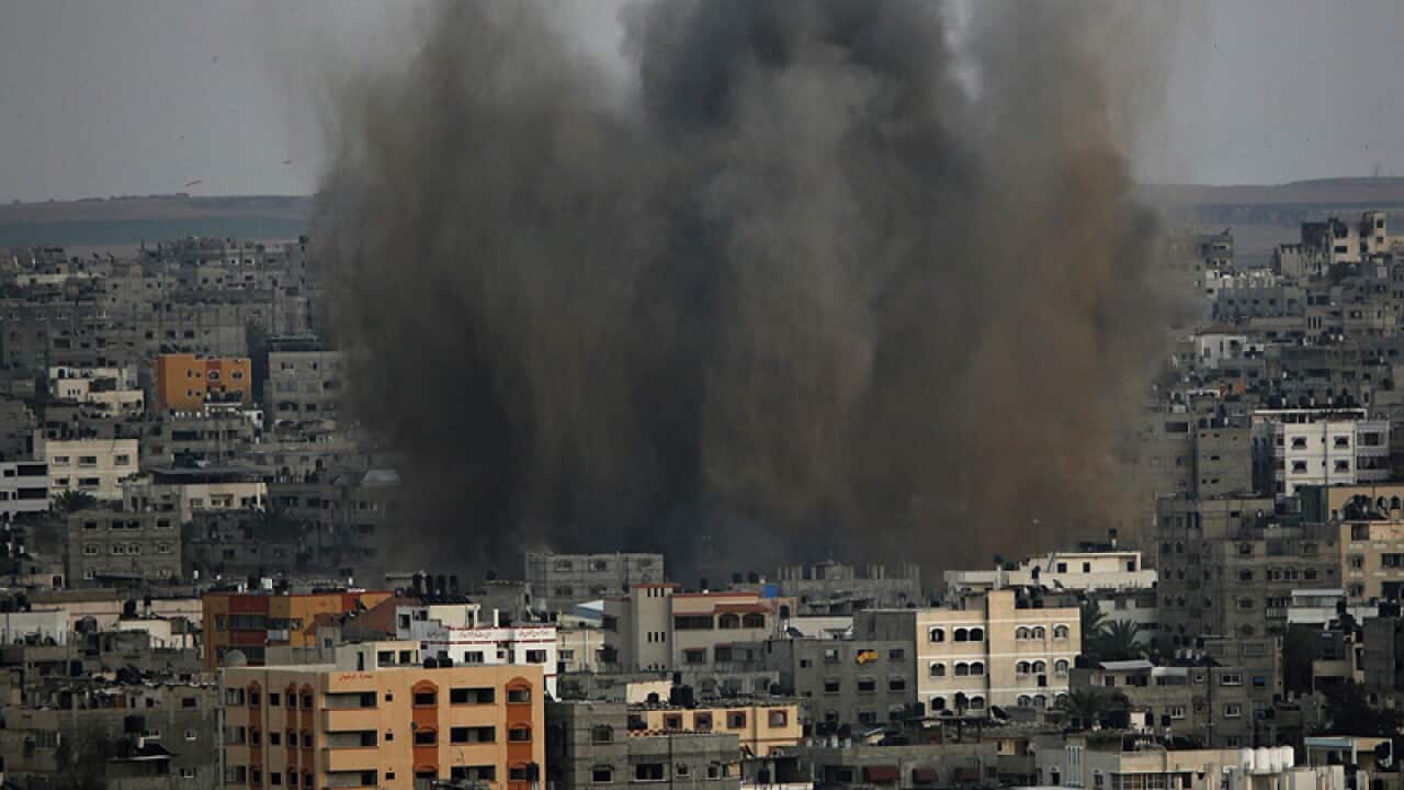 Smoke rises from an Israeli airstrike in Gaza.