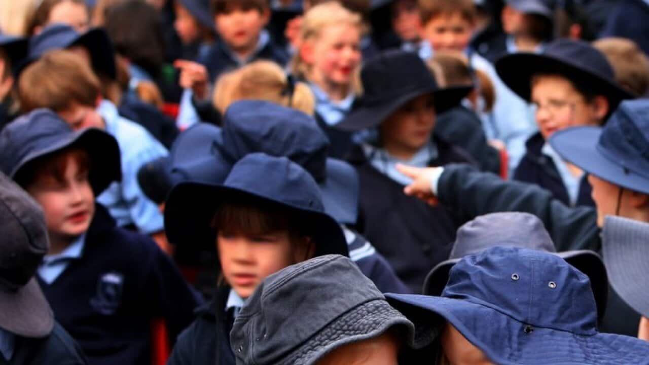 Students gather at Bowral Public School in Bowral, NSW, Wednesday, Aug. 27, 2008. (AAP Image/Jenny Evans) NO ARCHIVING