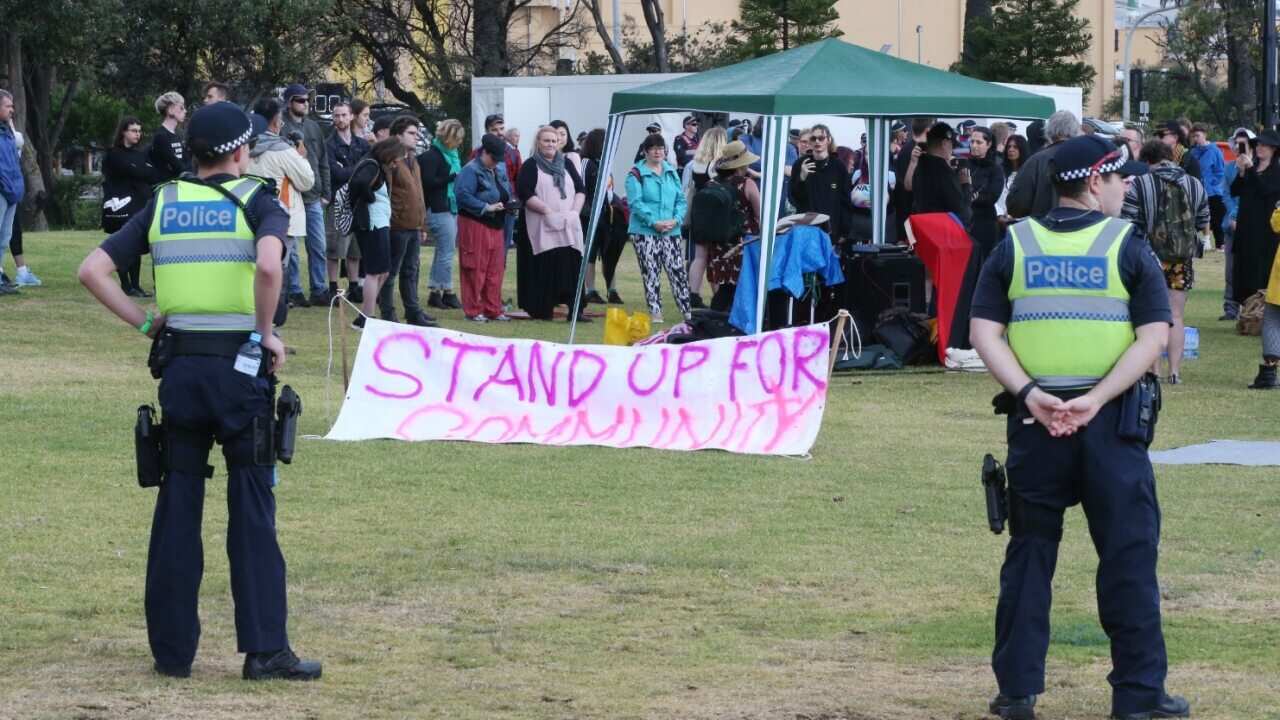 Police on standby on St Kilda foreshore in Melbourne, Saturday, January 5, 2019.