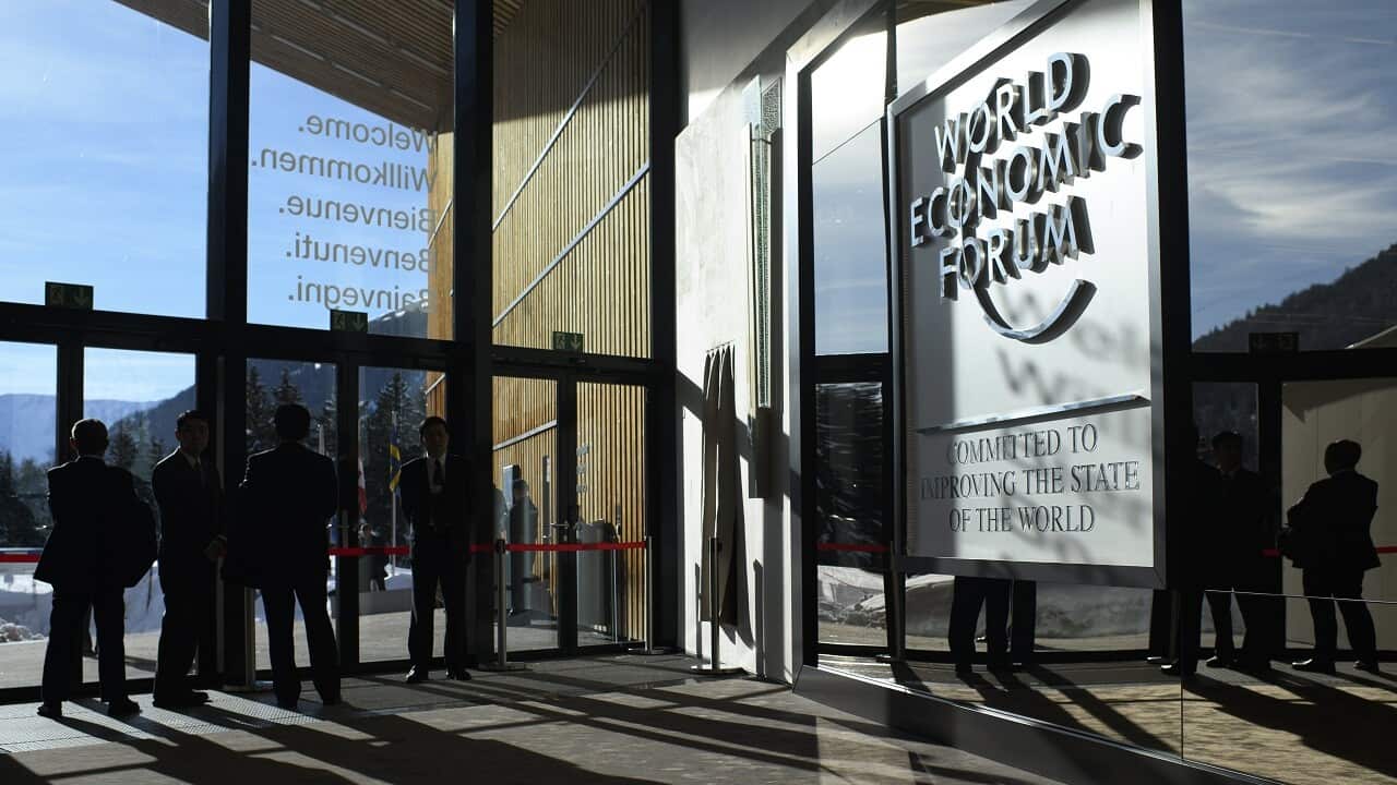 Businessmen cast shadows during the 48th annual meeting of the World Economic Forum, WEF, in Davos, Switzerland.