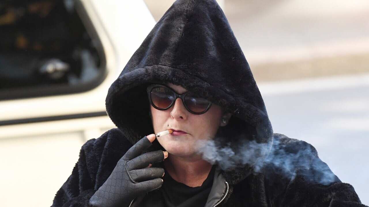 Alison Mains arrives at the Downing Centre Local Courts in Sydney
