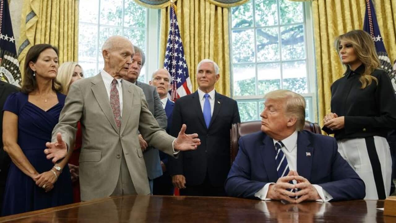 President Trump with the astronauts in the Oval Office