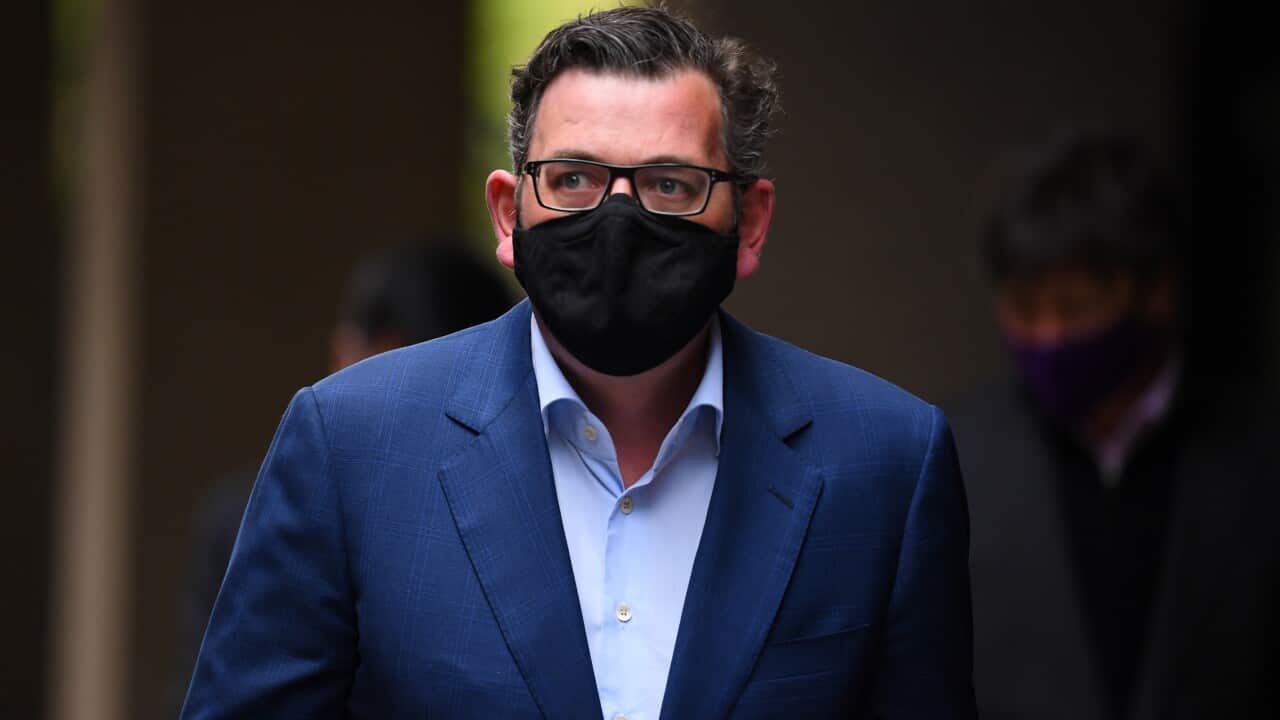 Victorian Premier Daniel Andrews arrives to a press conference after the state recorded 28 new cases of coronavirus and three deaths.