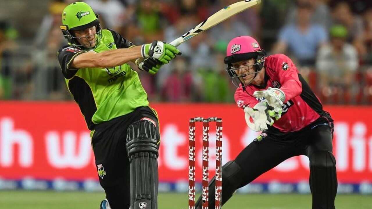 Shane Watson of the Thunder hits a four during the Big Bash League.
