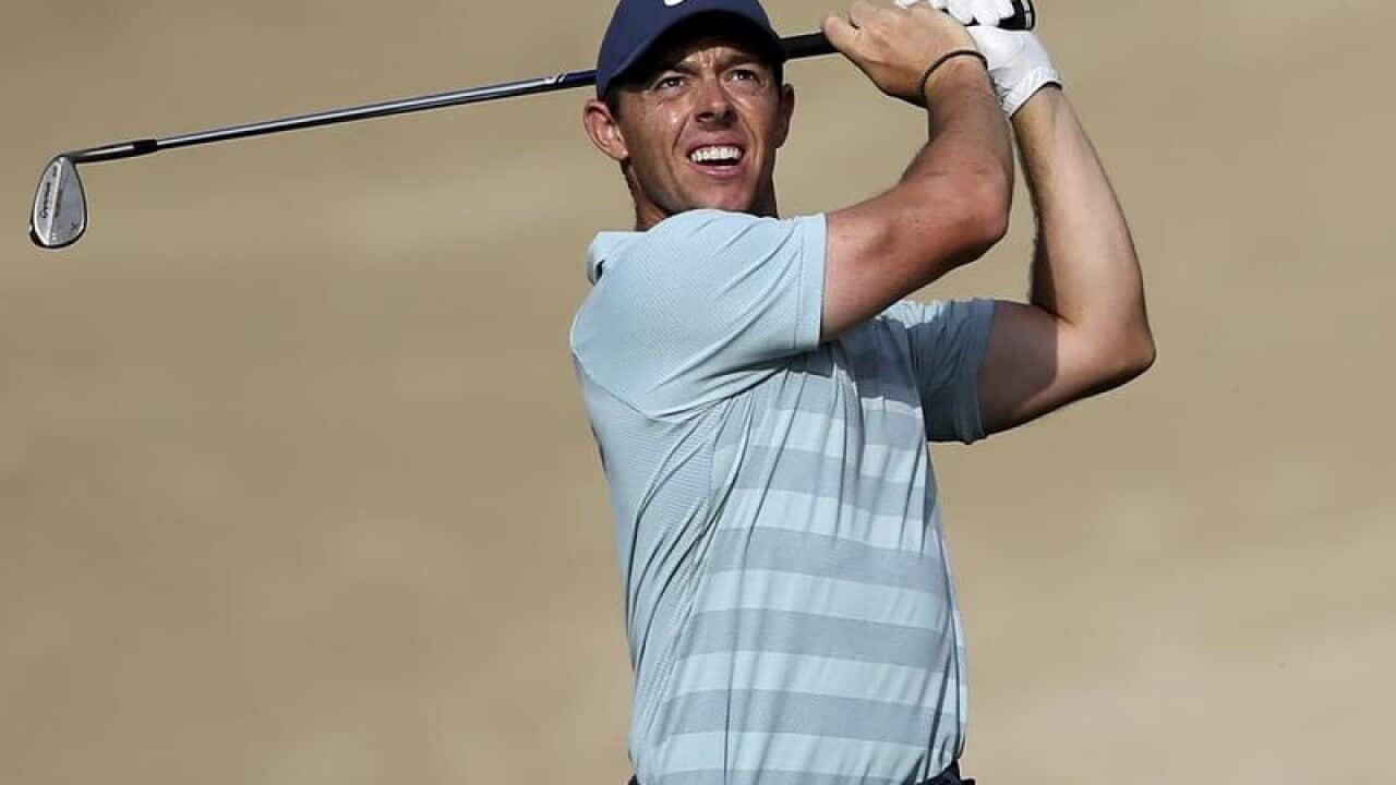 Golfer Rory McIlroy plays a shot during the Dubai Desert Classic.