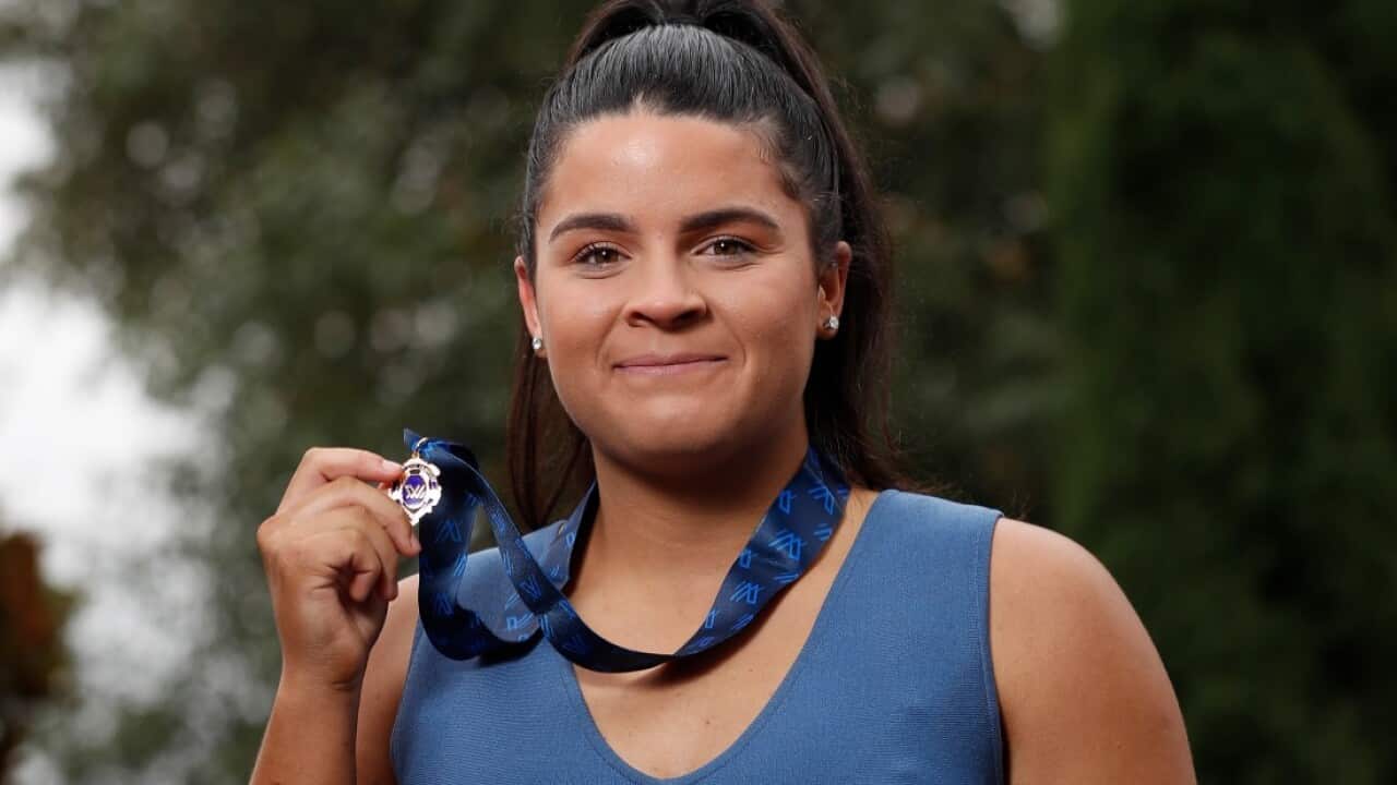 Madison Prespakis of the Blues poses for a photograph after being announced as the 2020 AFLW Best and Fairest winner.