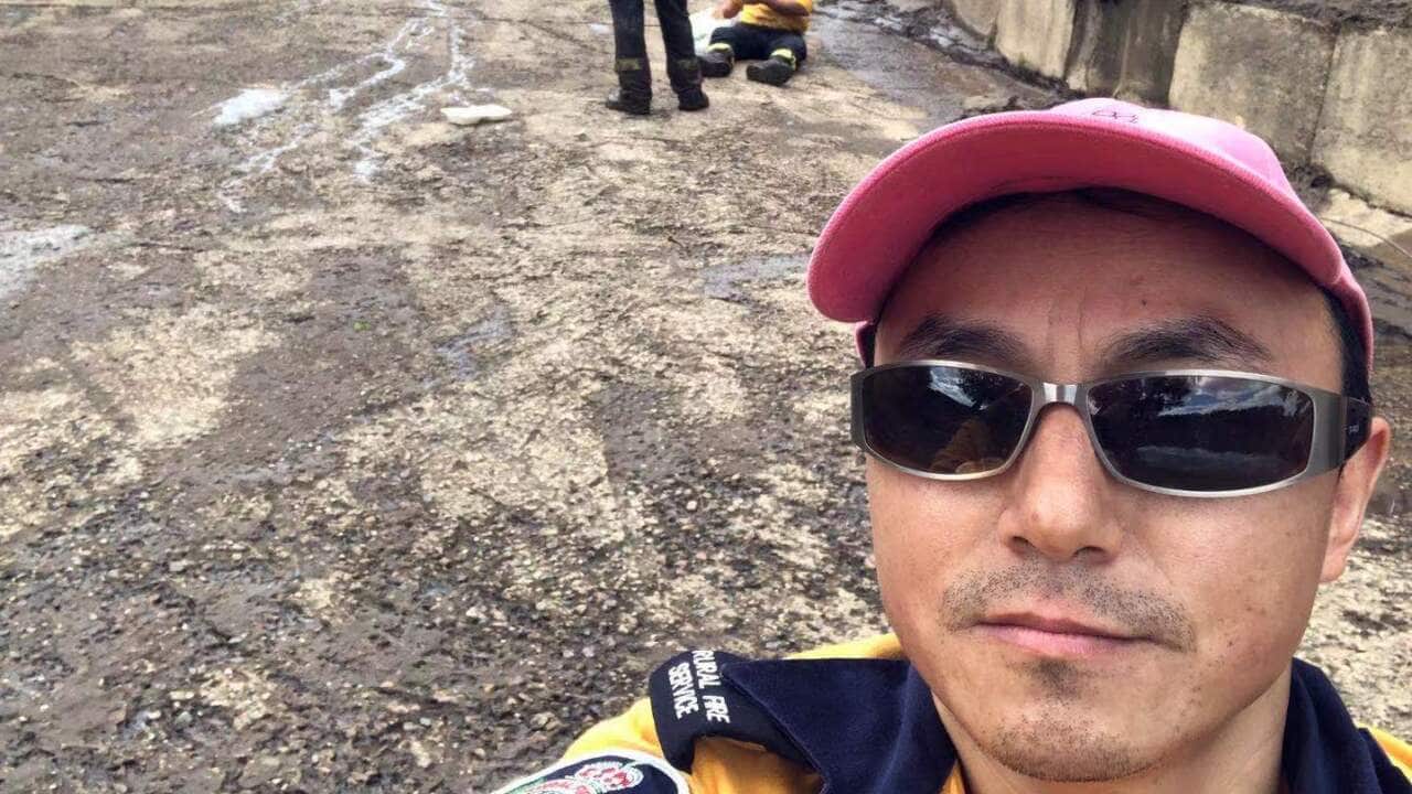 RFS华人志愿者Jack Liu参与水灾后的清理工作