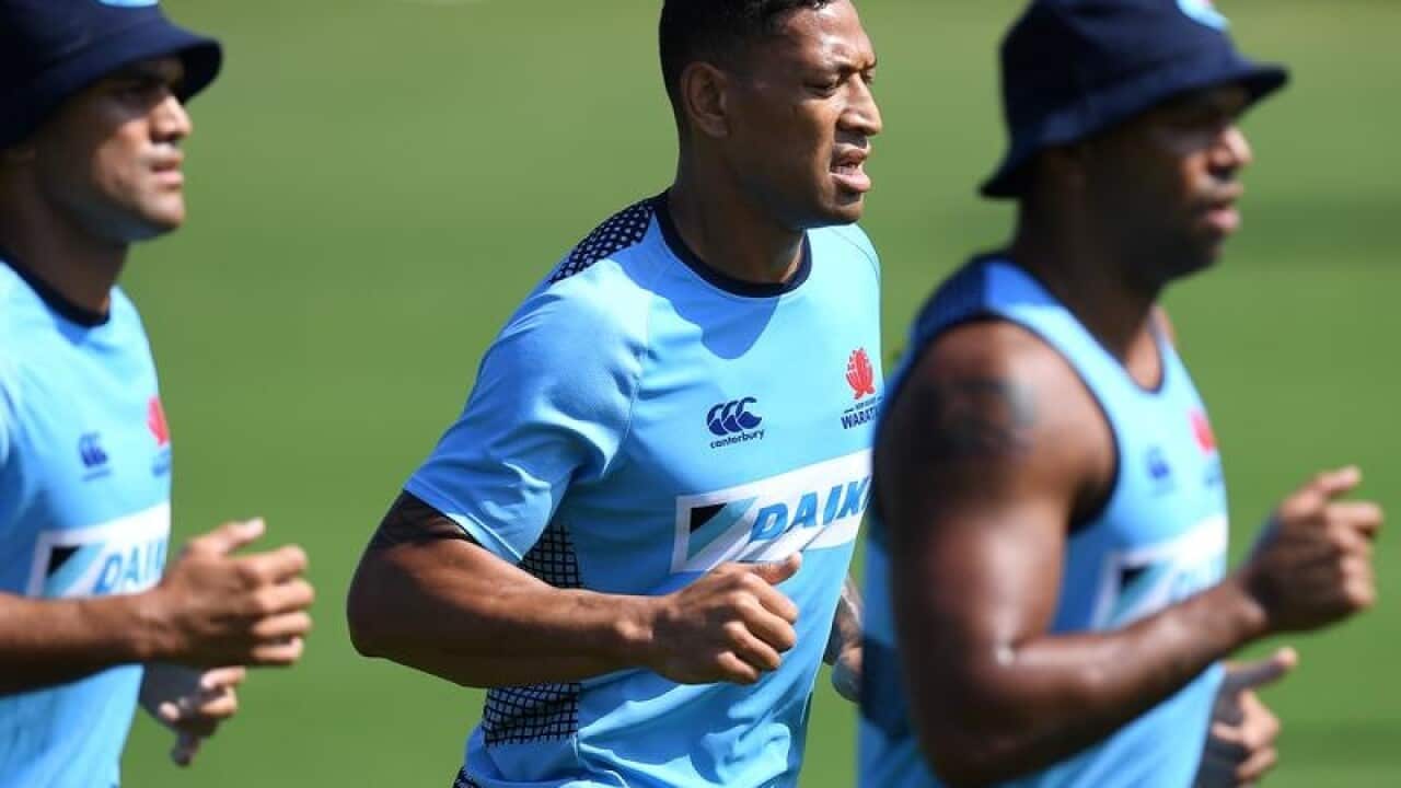 Israel Folau trains with his Waratahs teammates in Sydney