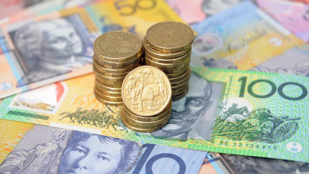 Australian dollars in Sydney, Friday, Jan. 15, 2016. (AAP Image/Joel Carrett) NO ARCHIVING