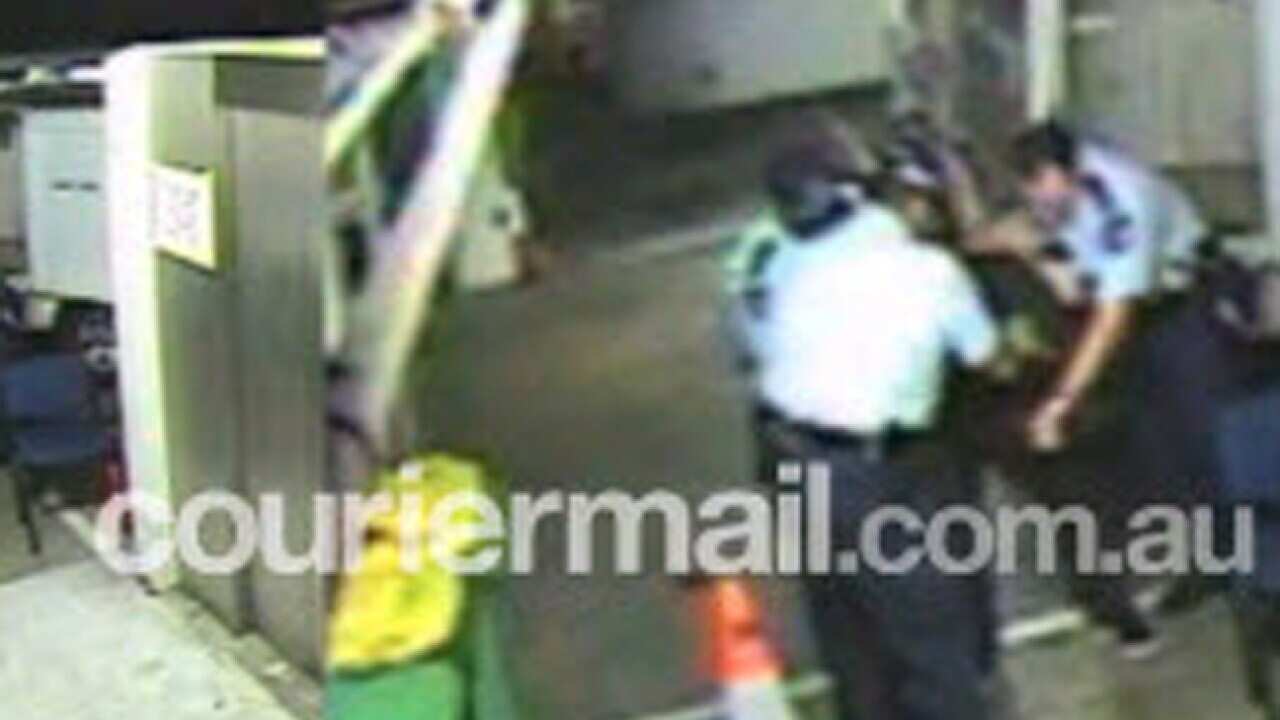 police_bashing_120215_b_couriermail_676183616