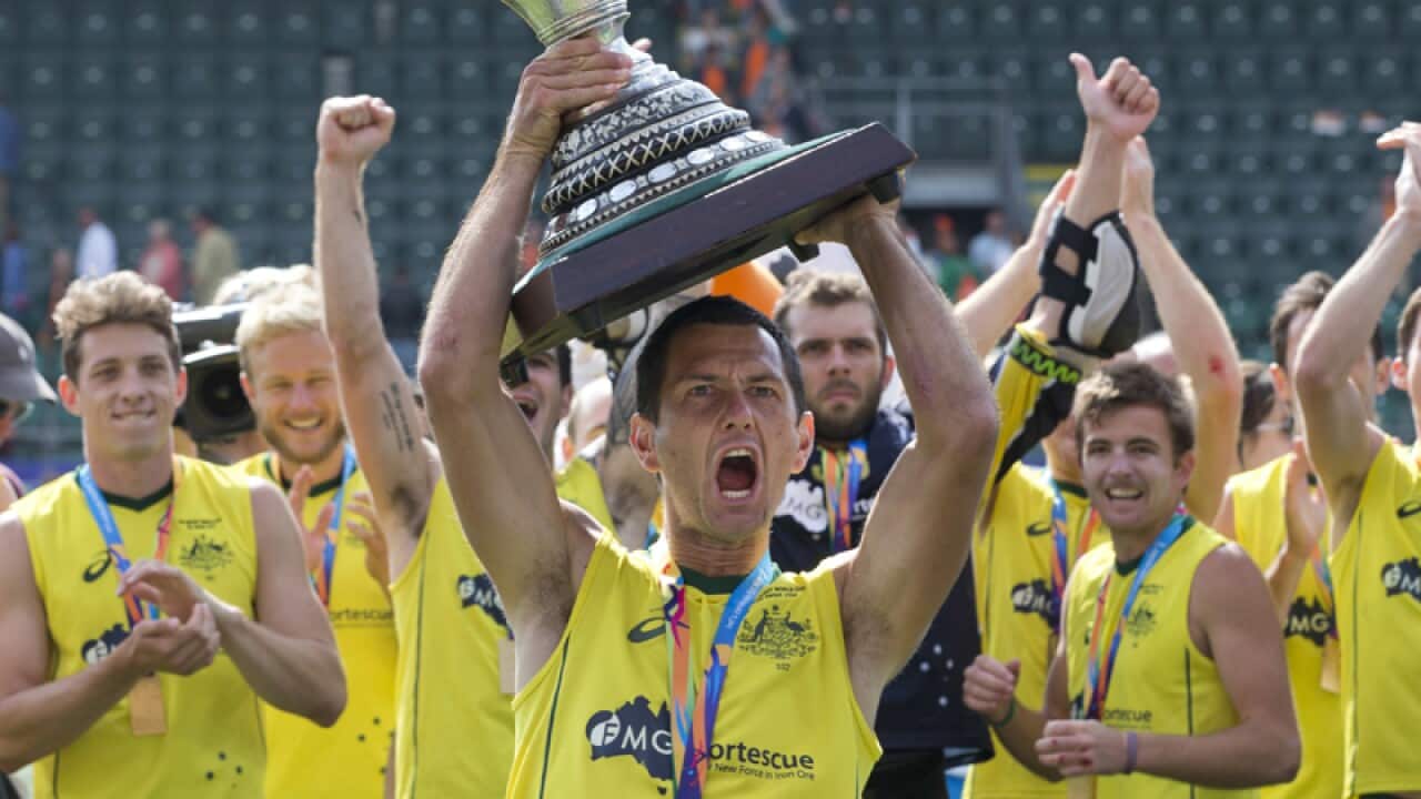 Australia's Jamie Dwyer celebrates with his teammates, FILE Photo