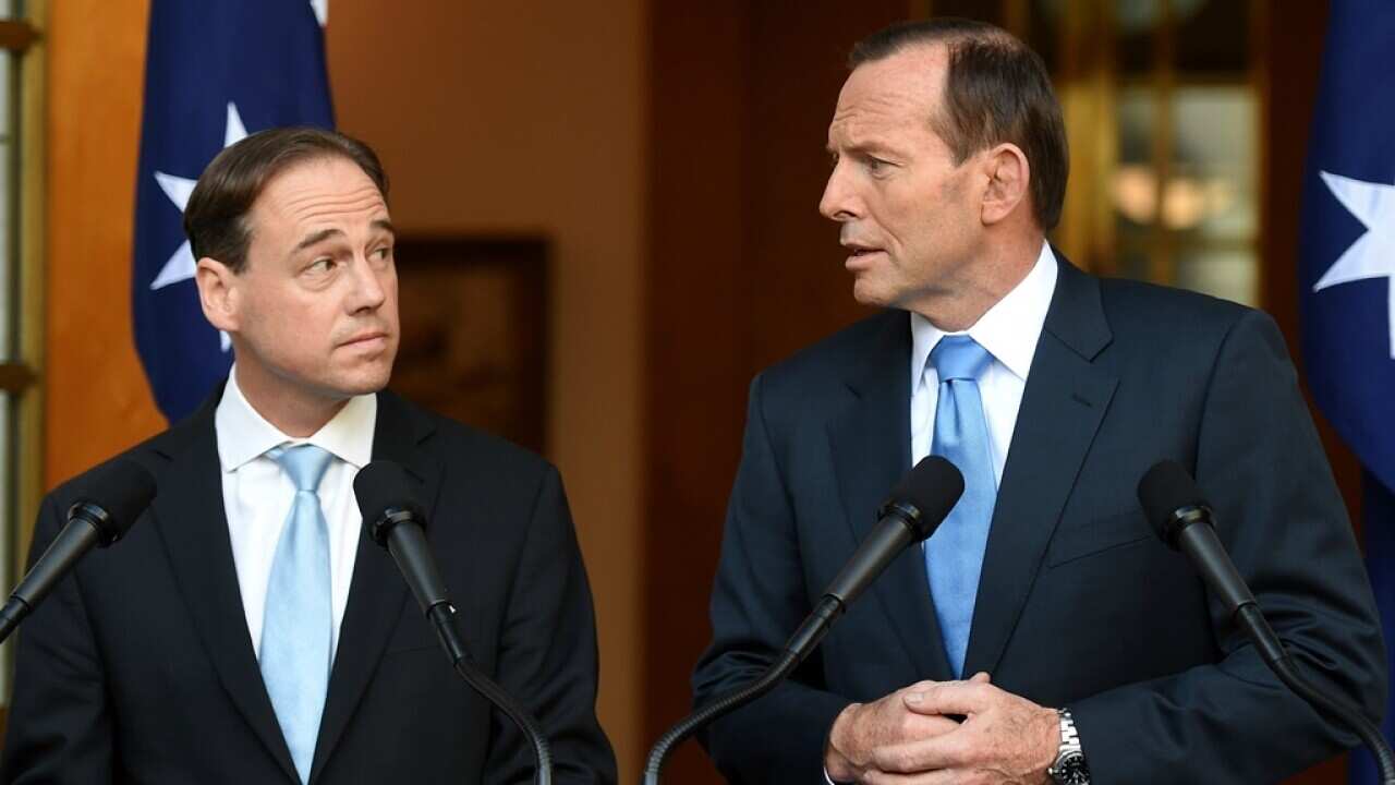 Greg Hunt Tony Abbott carbon tax repeal