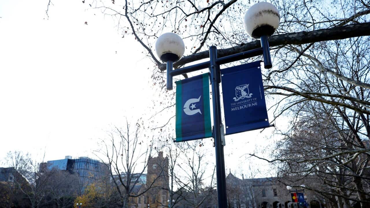 A general view of signage during an inquiry examining freedom of speech and assembly on Australian university campuses at the University of Melbourne (AAP Image-Con Chronis) .jpg