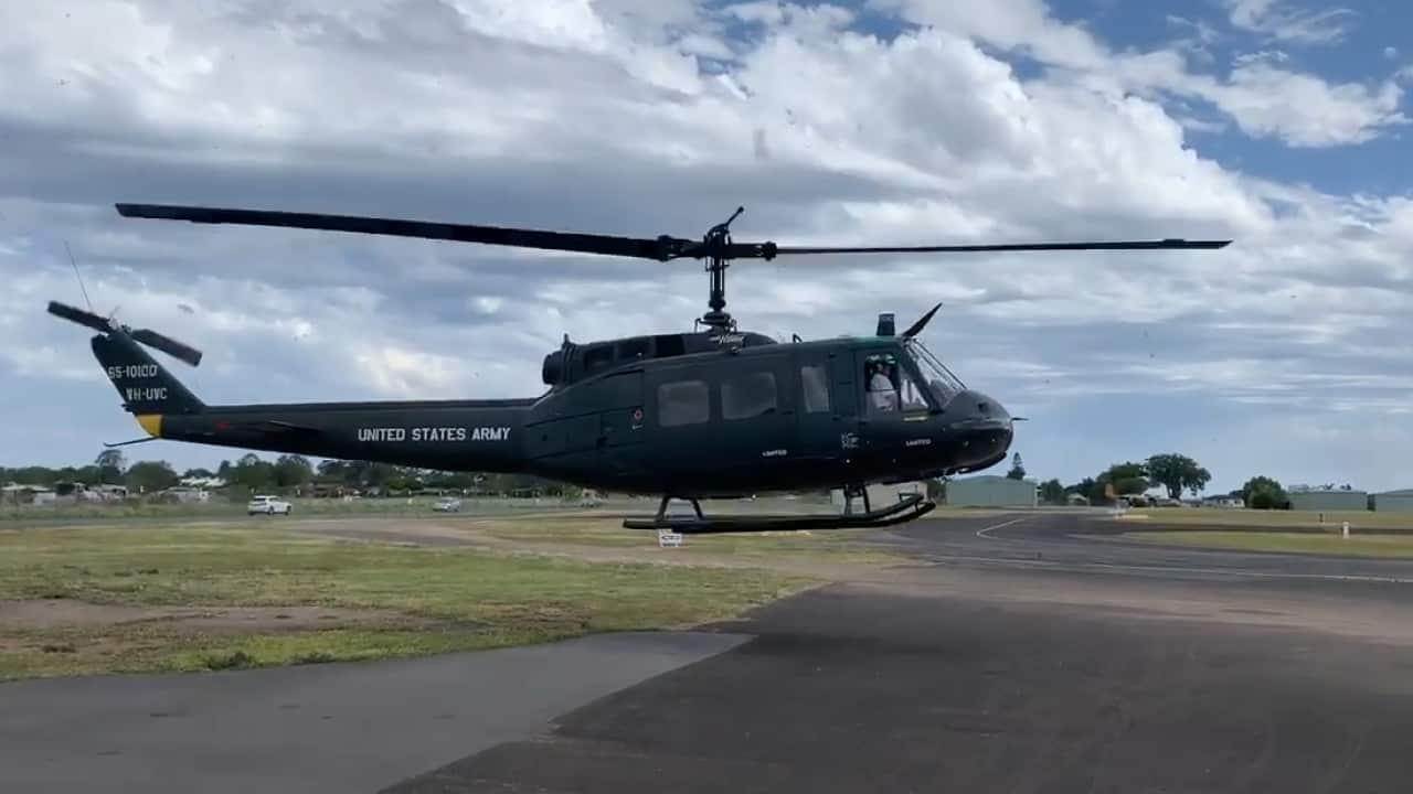 The helicopter is a Bell uh-1/B205.