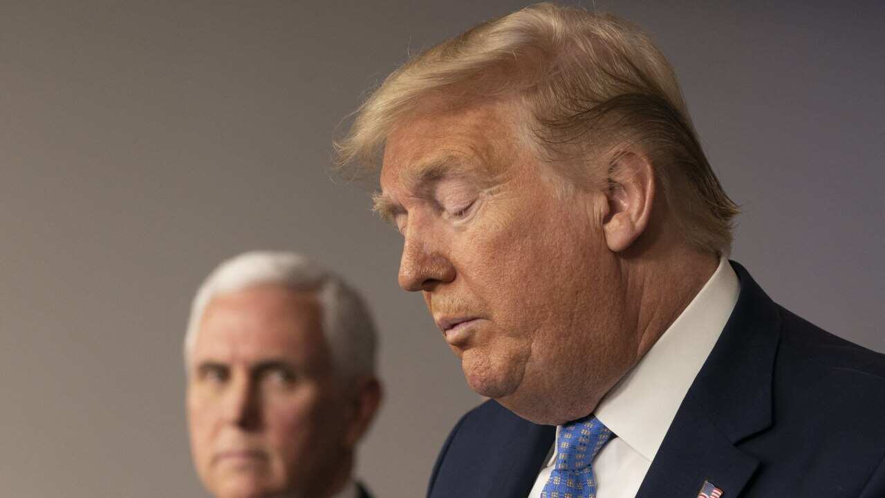 Donald Trump makes a statement on coronavirus during a news briefing at the White House.