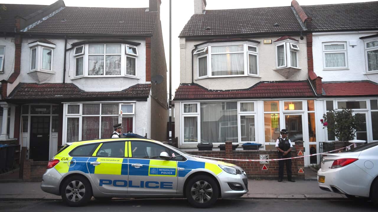 Police at the scene in Raymead Avenue, Thornton Heath, Croydon where a women who was around eight months pregnant has been stabbed to death.
