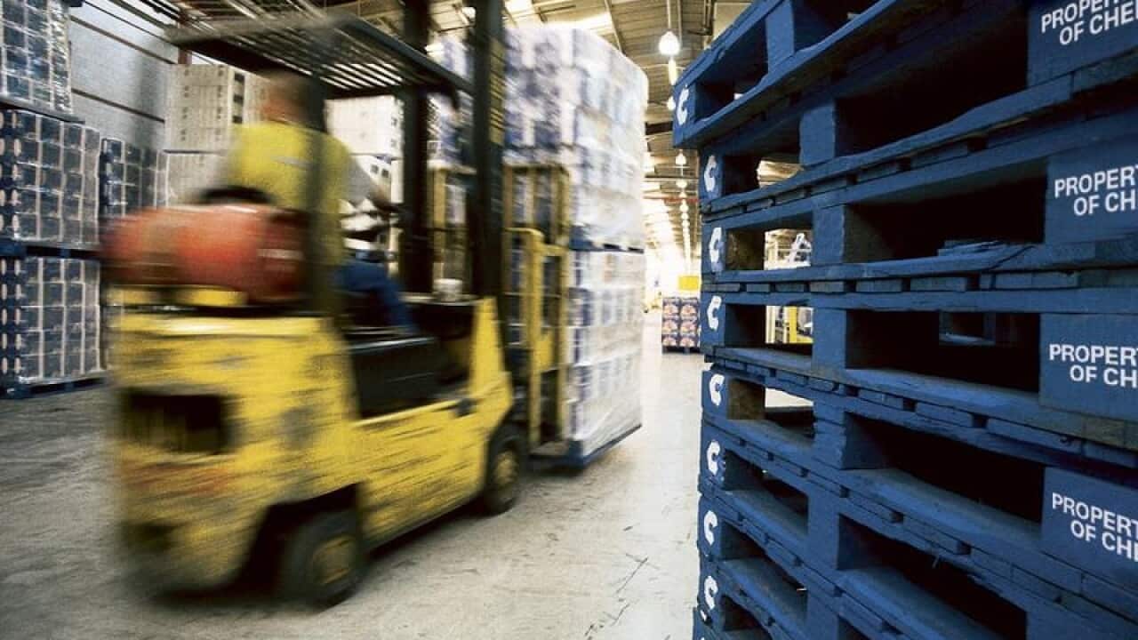 forklift, stacks of crates, pallets in Brambles subsidiary Chep plant