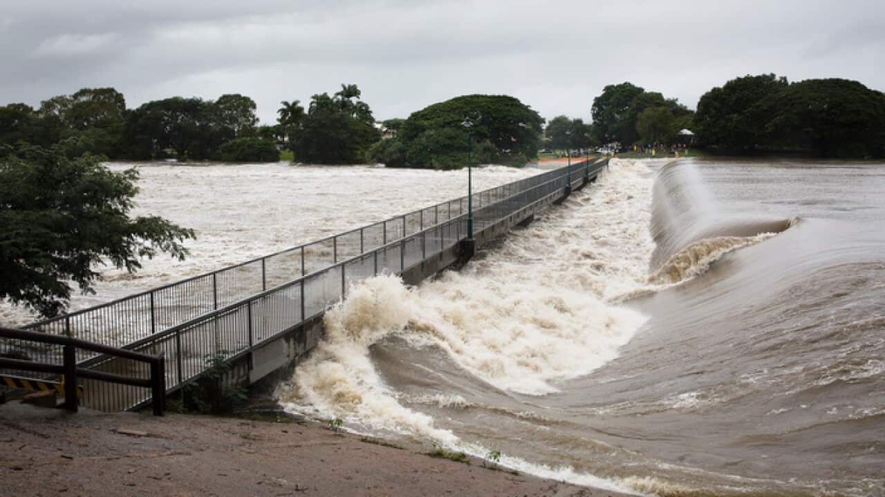 Floodwaters are seen at Aplins Weir in Townsville, Friday, February 1, 2019. Townsville residents are again being told to leave their homes as north Queensland's flood disaster rolls on. (AAP Image/Andrew Rankin) NO ARCHIVING