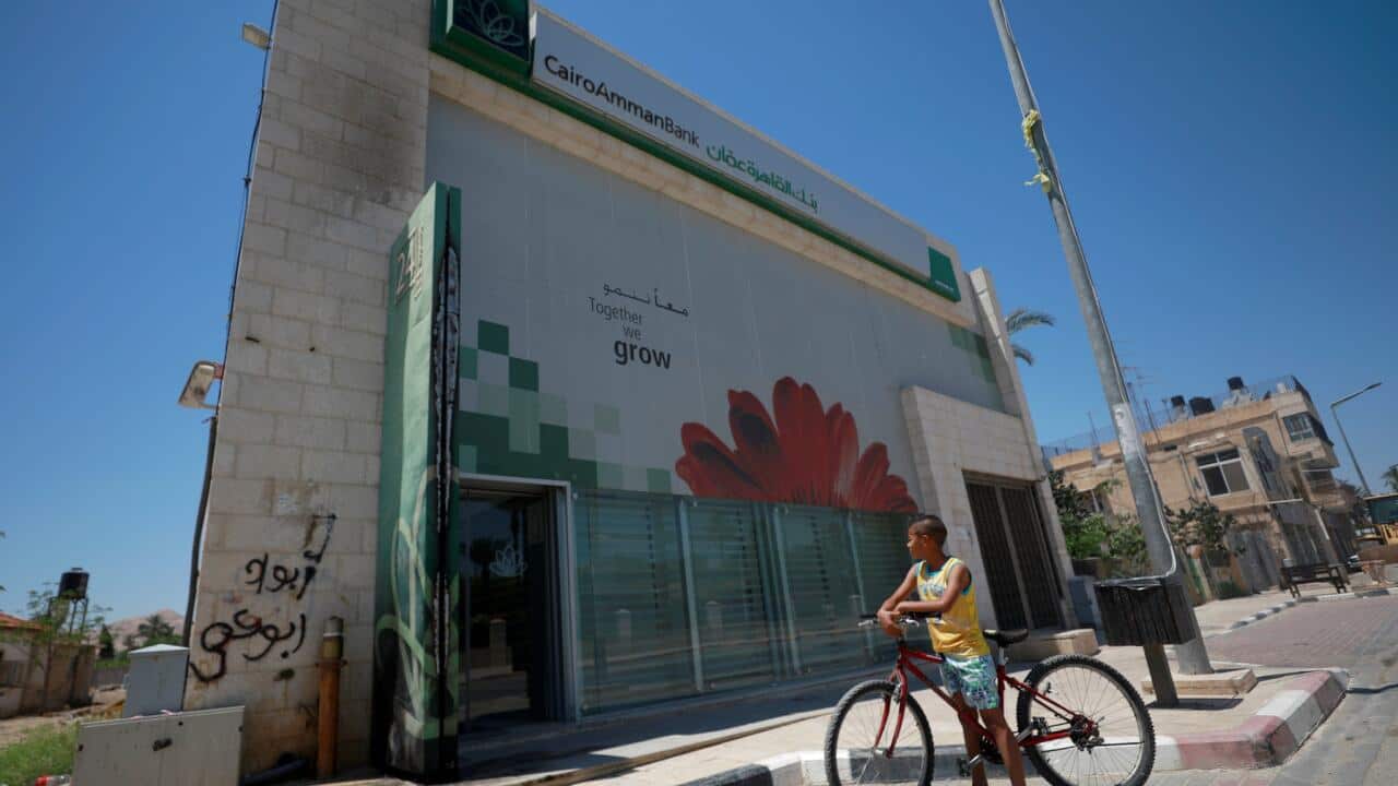 The Cairo Amman Bank in the West Bank city of Jericho was set ablaze this past week following the order.