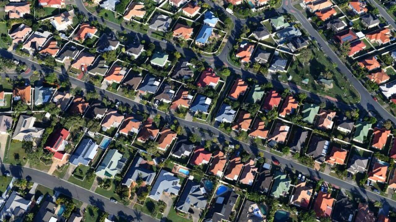 Aerial view of residential housing on the Gold Coast, Wednesday May 17, 2017. (AAP Image/Dave Hunt) NO ARCHIVING